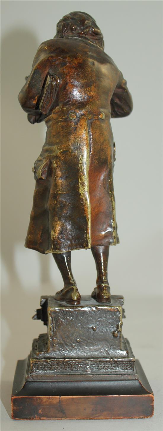 Karl Kauba (1865-1922). A bronze A Bookworm, 1922, 10in.